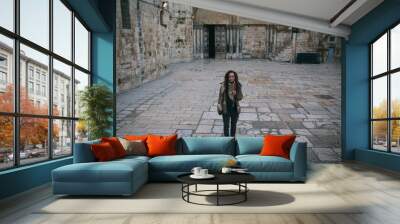 Young woman near Church of the Holy Sepulchre in Old City of Jerusalem Wall mural