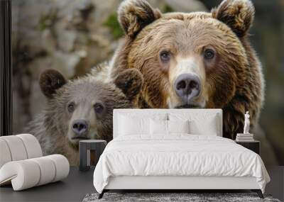 Grizzly bear mother and cub resting together in a natural habitat, close up view Wall mural