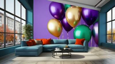 Shiny purple, green and gold balloons are floating on a purple background for fat tuesday celebration Wall mural