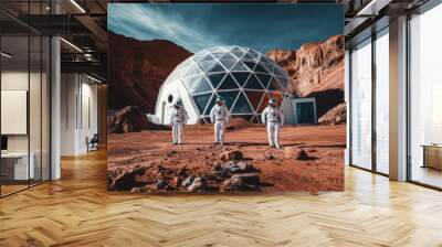 Three astronauts in white spacesuits are standing in front of a futuristic geodesic dome habitat on a red planet, possibly mars Wall mural