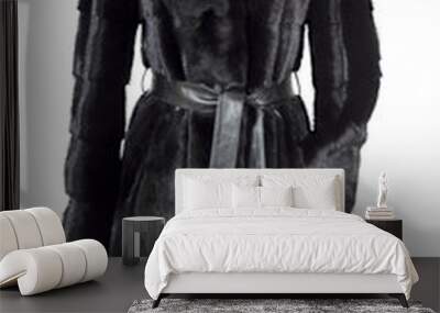 black fur coat isolated on white Wall mural