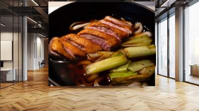 A bowl of duck and leek udon. Wall mural