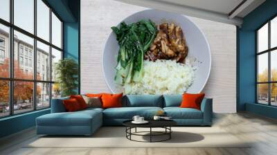 A plate of rice with soy chicken and bok choy. Wall mural