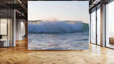 Clean wave shore break view in the morning. Wall mural