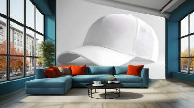 A high-quality mockup of a blank white baseball and trucker hat placed on a light background Wall mural