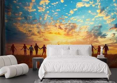 Giving a helping hand concept of unity, teamwork and charity with sunrise background. Wall mural