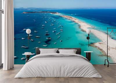 Aerial view of the beaches of Ses Illetes on the island of Formentera in the Balearic Islands, Spain - Turquoise waters on both sides of a sand strip in the Mediterranean Sea Wall mural