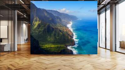 Aerial view of the dramatic ridges of the Na Pali coast, looming over the Pacific Ocean on the northwestern side of Kauai island in Hawaii Wall mural