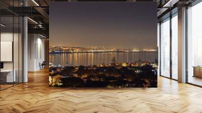 Panoramic aerial view of Cascais Bay with Rei Cristo statue in background and Ponte 25 Abril, Portugal Wall mural