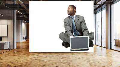 african man sitting on white background withe laptop Wall mural