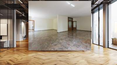 Large living room with white walls and marble floor. Interior vintage abandoned villa ready to be demolished Wall mural