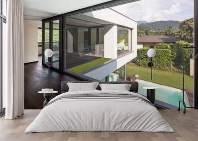 Large window in hallway of modern villa overlooking the private pool Wall mural