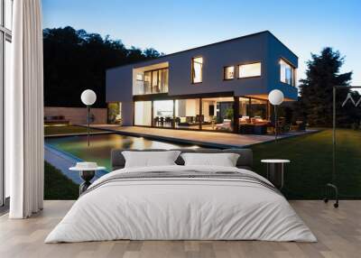 Modern villa with pool, night scene Wall mural