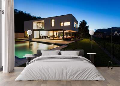 Modern villa with pool, night scene Wall mural