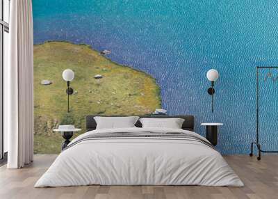 Small island on a blue mountain lake  Wall mural