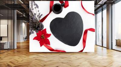 Heart shaped black plate dinner or lunch table setting for valentine day romantic celebration Wall mural