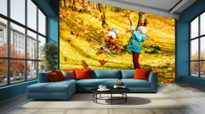 Family fun time at autumn park with kid and pet dog Wall mural