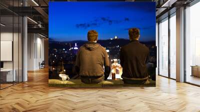 'Masters of the world': Two young men staring at sunset over Barcelona Wall mural