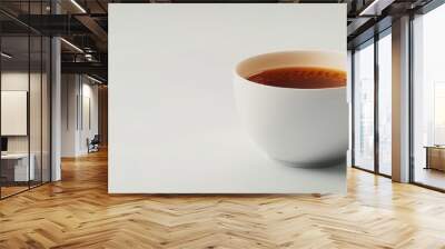 Freshly brewed cup of black tea with milk on white background, 4K hyperrealistic photo Wall mural