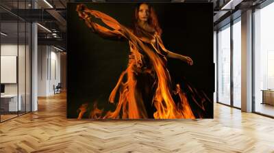 A woman symbolizing fire Wall mural