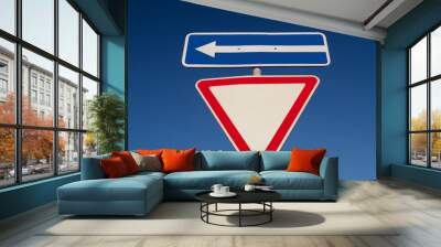 Traffic sign against the blue sky Wall mural