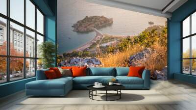 Sunset view on Sveti Stefan Island City. Montenegro. Balkans, Adriatic sea Wall mural