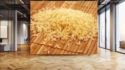 Rice on chinese bamboo mat, close up. Wall mural