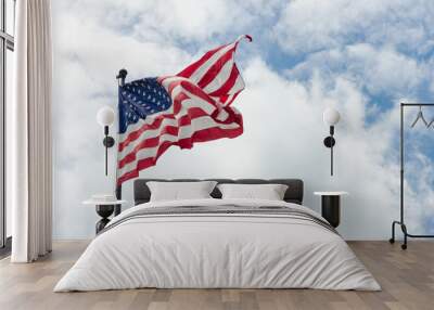 us american flag waving in the wind with beautiful blue cloudy sky in background Wall mural