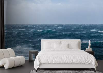 Beautiful seascape - waves and sky with clouds with beautiful lighting. Stormy sea, Bad weather. Gale. Rough sea. Wall mural