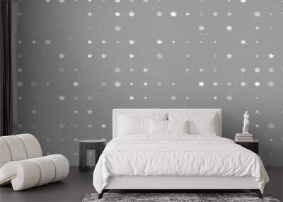 Seamless background pattern of evenly spaced white maple leafs of different sizes and opacity. Vector illustration on gray background with stars Wall mural