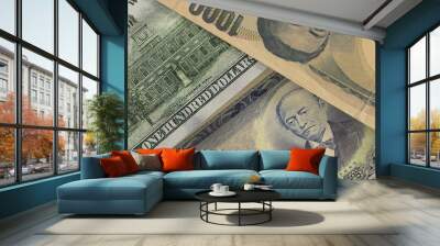 Back of US $100 bill with Japanese yen bills in the background. Foreign exchange market. Financial concept Wall mural