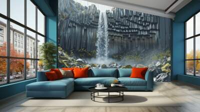 Waterfall flowing over basalt columns in a volcanic landscape, 4K hyperrealistic photo Wall mural