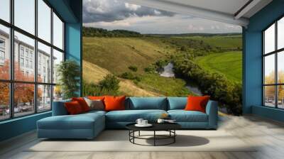 Beautiful high riverbank and clouds Wall mural