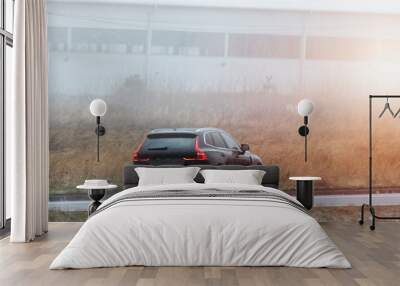 A sporty and elegant SUV. A vehicle for the future with offroad capabilities. Wall mural