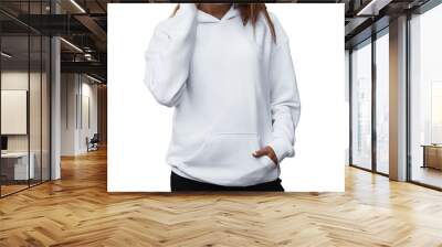 A young girl wears a white hoodie. No logo basic sportswear. Long sleeve sweatshirt mockup. Wall mural