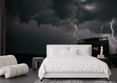 lightning in the night sky. heavy thunderstorms with striking Wall mural