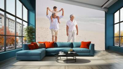 Family, grandparents walking with child on beach and travel, love and vacation with mockup space and sea view. Senior people with boy, trust and support with tourism in Mexico and bonding together Wall mural