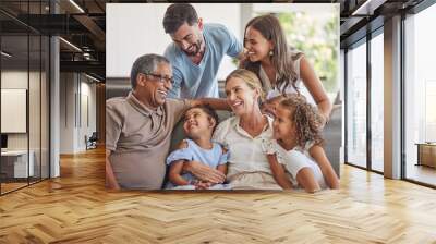 Relax, love and big family happy on sofa smile together in home on the weekend with children. Cheerful and diverse senior grandparents, parents and young kids in Brazil bond in living room. Wall mural