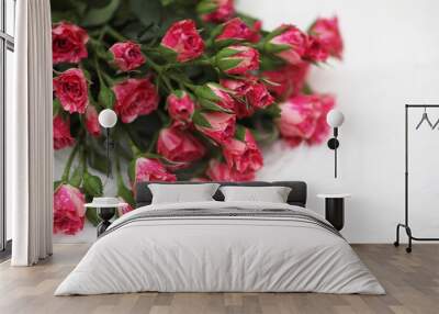 Bouquet of red roses on a white background Wall mural