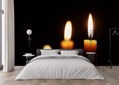 candle flame isolated on black Wall mural