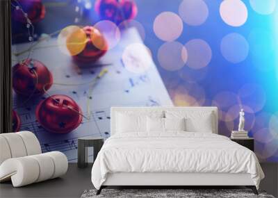 Christmas carol with jingle bells and candles Wall mural