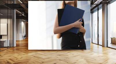 Girl with documents at a business meeting Wall mural