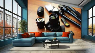 Professional Photography Equipment on Wooden Table with Camera, Lenses, and Tripods Wall mural