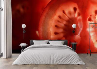 Red tomato cut in half with the texture of seeds Wall mural