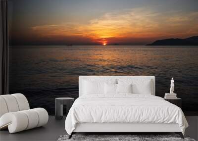 Landscape with orange sunrise in the morning at the sea in summer at a resort in Asia Wall mural