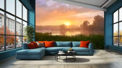 Foggy morning. Dawn outside the city. It will be a warm day. Morning fog on the lake Wall mural