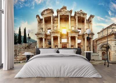 Facade of antique library of Celsus in Ephesus on sunny day Wall mural