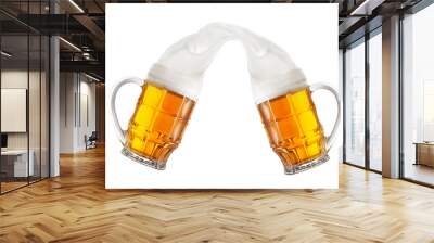 Two mugs of beer with foam pouring into each other Wall mural