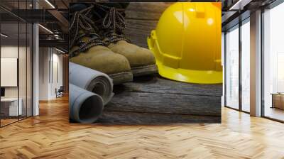 Construction tools with helmet on table Wall mural