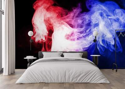 Column of vape clouds splash on black background. A lot of lines of smoke. Two colours fog is blue and purple. Stock isolated color smoke with spray boiling liquid. Wall mural